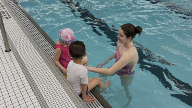 Children learning swim techniques with Southern Tier Aquatics